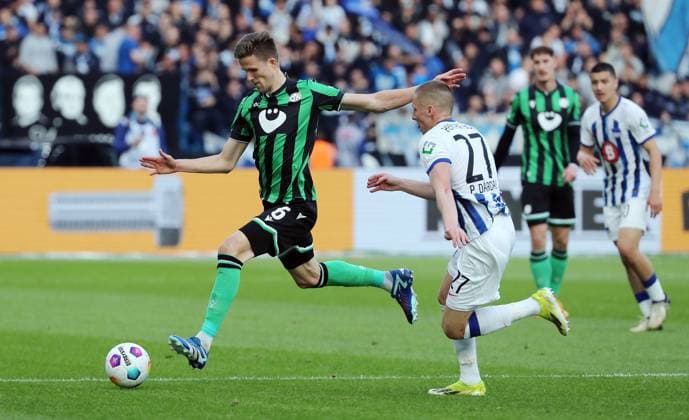 Fabian Kunze in a duel with Palko Dardai Sport Football Soccer DFL 2 Bundesliga Men 31 Matchday Season 2023 2024 26 04 2024 Hertha BSC Berlin vs Hannover 96 DFL regulations prohibit any use of photographs as image sequences and or quasi video