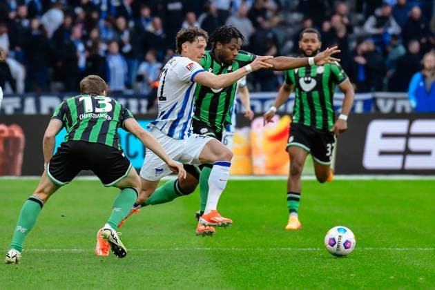 Soccer 2 Bundesliga, Hertha BSC Hannover 96 26 04 2024,xdanx,Soccer 2 Bundesliga, Hertha BSC Hannover 96, v l Max Christiansen Hannover 96 13 ,Fabian Reese Hertha BSC 11 ,Bright Arrey Mbi Hannover 96 4 ,Zweikampf, Duell, Kampf, tackle DFL DFB REGULATIONS PROHIBIT ANY USE OF PHOTOGRAPHS as IMAGE SEQUENCES and or QUASI VIDEO Foto Daniel Lakomski Berlin Olympiastadion Berlin Berlin Germany EN Copyright: xDanielxLakomskix