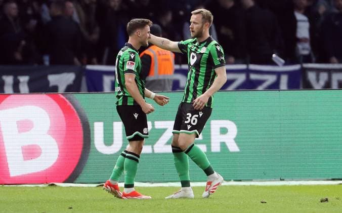 Enzo Leopold cheers after equalizing 1 1 with Cedric Teuchert Joy Emotion Jubilation Sport Soccer Football DFL 2 Bundesliga Men 31 Matchday Season 2023 2024 26 04 2024 Hertha BSC Berlin vs Hannover 96 DFL regulations prohibit any use of photographs as image sequences and or quasi video