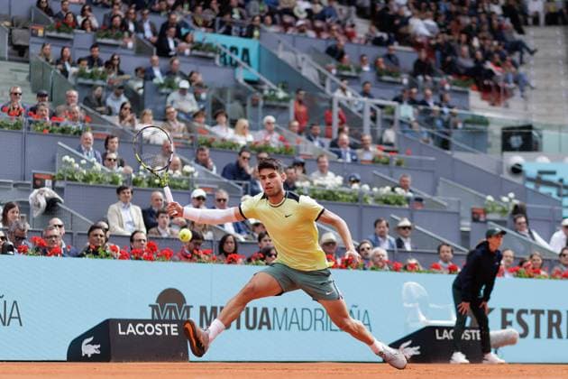 April 26, 2024, Madrid, Spain: Carlos Alcaraz plays against Alexander Shevchenko (not pictured) during their match on Day 5 of the Mutua Madrid Open at Caja Magica Stadium. Carlos Alcaraz won 6-2 , 6-1 Madrid Spain - ZUMAs197 20240426_aaa_s197_093 Copyright: xGuillermoxMartinezx