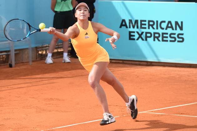 (240427) -- MADRID, April 27, 2024 -- Wang Xinyu hits a return during Women s Singles 2nd round match between Wang Xinyu of China and Caroline Garcia of France at the Madrid Open tennis tournament in Madrid, Spain, April 26, 2024. (Photo by Xinhua) (SP)SPAIN-MADRID-TENNIS-2024 MADRID OPEN-WOMEN S SINGLES GustavoxValiente 