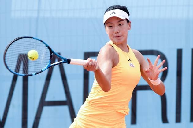 (240427) -- MADRID, April 27, 2024 -- Wang Xinyu hits a return during Women s Singles 2nd round match between Wang Xinyu of China and Caroline Garcia of France at the Madrid Open tennis tournament in Madrid, Spain, April 26, 2024. (Photo by Xinhua) (SP)SPAIN-MADRID-TENNIS-2024 MADRID OPEN-WOMEN S SINGLES GustavoxValiente 