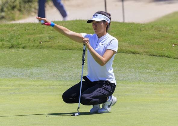 April 27, 2024, Los Angeles, California, USA: Jennifer Chang lines up her putt during Round 3 of the JM Eagle LA Championship presented by Plastpro on Saturday April 27, 2024 at the Wilshire Country Club in Los Angeles, California. ARIANA RUIZ PI Los Angeles U.S - ZUMAp124 20240427_zaa_p124_031 Copyright: xArianaxRuizx