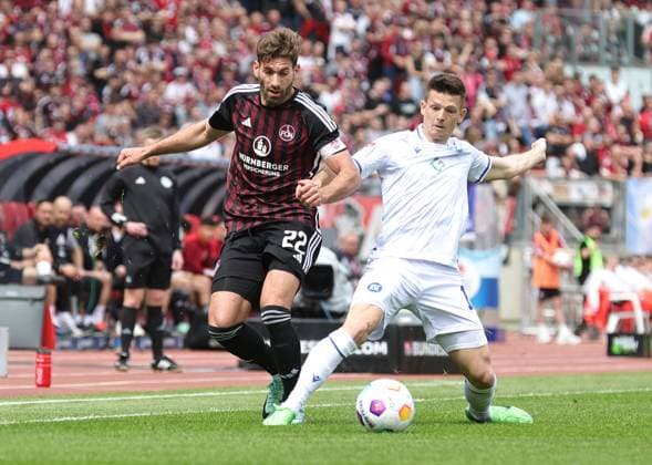 28 04 2024 Soccer Season 2023 2024 2 Soccer Bundesliga 31 Matchday 1 FC Nürnberg FCN Club Karlsruher SC KSC Sportfoto Zink DaMa xdaxmax DFL regulations prohibit any use of photographs as image sequences and or quasi video only for editorial use Enrico Valentini 22, 1 FC Nürnberg FCN Marvin Wanitzek 10, Karlsruher SC KSC