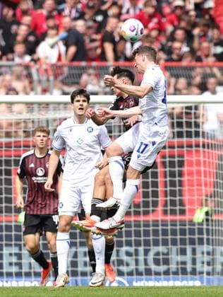 28 04 2024 Soccer Season 2023 2024 2 Soccer Bundesliga 31 Matchday 1 FC Nürnberg FCN Club Karlsruher SC KSC Sportfoto Zink DaMa xdaxmax DFL regulations prohibit any use of photographs as image sequences and or quasi video only for editorial use Can Yilmaz Uzun 42, 1 FC Nürnberg FCN Nicolai Rapp 17, Karlsruher SC KSC