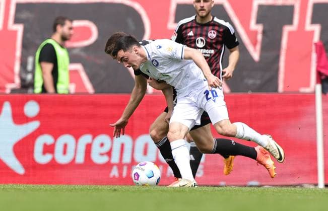 28 04 2024 Soccer Season 2023 2024 2 Soccer Bundesliga 31 Matchday 1 FC Nürnberg FCN Club Karlsruher SC KSC Sportfoto Zink DaMa xdaxmax DFL regulations prohibit any use of photographs as image sequences and or quasi video only for editorial use Florian Flick 6, 1 FC Nürnberg FCN Paul Nebel 26, Karlsruher SC KSC
