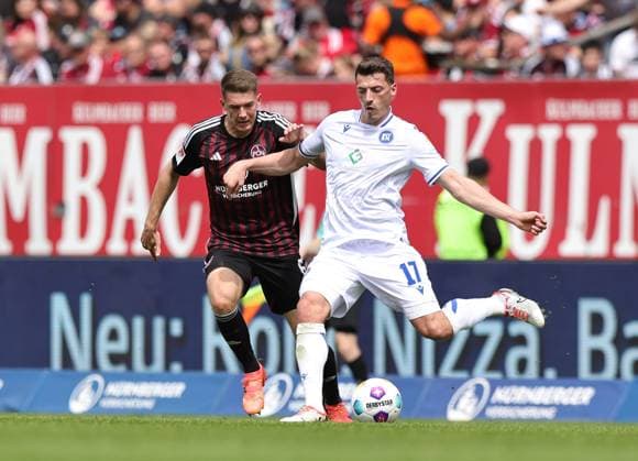 28 04 2024 Soccer Season 2023 2024 2 Soccer Bundesliga 31 Matchday 1 FC Nürnberg FCN Club Karlsruher SC KSC Sportfoto Zink DaMa xdaxmax DFL regulations prohibit any use of photographs as image sequences and or quasi video only for editorial use Florian Flick 6, 1 FC Nürnberg FCN Nicolai Rapp 17, Karlsruher SC KSC