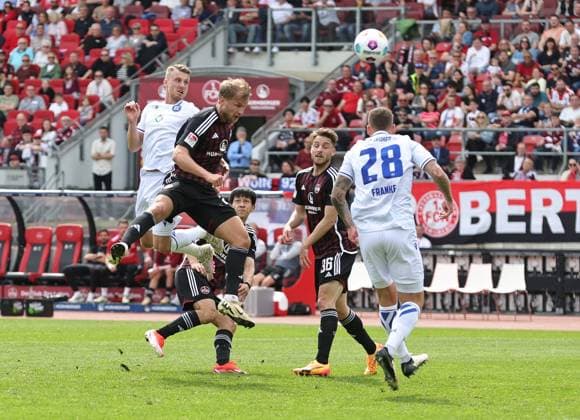 28 04 2024 Soccer Season 2023 2024 2 Soccer Bundesliga 31 Matchday 1 FC Nürnberg FCN Club Karlsruher SC KSC Sportfoto Zink DaMa xdaxmax DFL regulations prohibit any use of photographs as image sequences and or quasi video only for editorial use Sebastian Andersson 20, 1 FC Nürnberg FCN with header