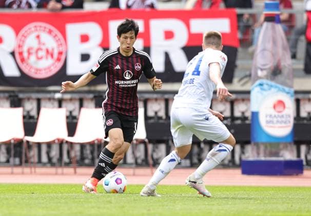 28 04 2024 Soccer Season 2023 2024 2 Soccer Bundesliga 31 Matchday 1 FC Nürnberg FCN Club Karlsruher SC KSC Sportfoto Zink DaMa xdaxmax DFL regulations prohibit any use of photographs as image sequences and or quasi video only for editorial use Kanji Okunuki 11, 1 FC Nürnberg FCN Marco Thiede 21, Karlsruher SC KSC
