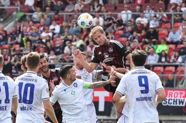 28 04 2024 Soccer Season 2023 2024 2 Soccer Bundesliga 31 Matchday 1 FC Nürnberg FCN Club Karlsruher SC KSC Sportfoto Zink DaMa xdaxmax DFL regulations prohibit any use of photographs as image sequences and or quasi video only for editorial use Sebastian Andersson 20, 1 FC Nürnberg FCN with header