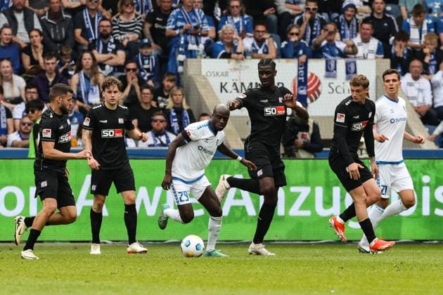 Amara Conde 1 FC Magdeburg,29 vs Maxwell Gyamfi VfL Osnabrück,4 2 Soccer Bundesliga Season 2023 2024 1 FC Magdeburg vs VfL Osnabrück at the MDCC Arena in Magdeburg Action,Soccer,Man,Men,Germany,28 04 2024