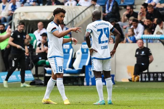 Leon Bell Bell 1 FC Magdeburg,19 with Amara Conde 1 FC Magdeburg,29 2 Soccer Bundesliga Season 2023 2024 1 FC Magdeburg vs VfL Osnabrück at the MDCC Arena in Magdeburg Action,Soccer,Man,Men,Germany,28 04 2024