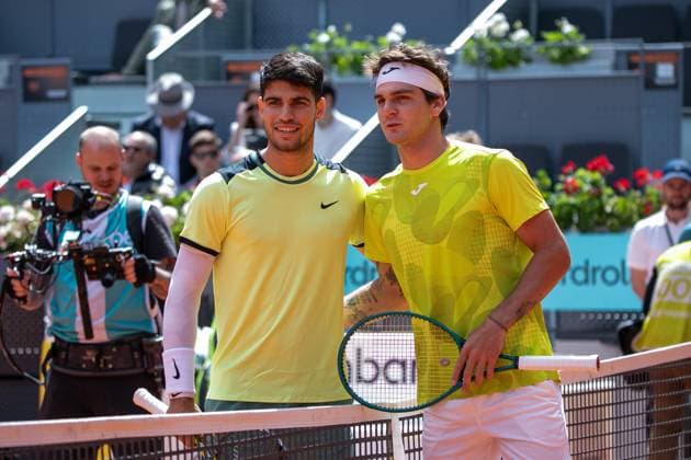 April 28, 2024, Madrid, Spain: Spanish tennis player Carlos Alcaraz and Brazilian Thiago Seyboth Wild pose before facing each other in a tennis match at the Caja Magica. The Spanish tennis player Carlos Alcaraz has qualified for the round of 16 of the ATP, Tennis Herren Masters 1000 in Madrid after beating the Brazilian Thiago Seyboth Wild in two sets 6-3 and 6-3. Next Tuesday he will face the German Jan-Lennard Struff. Madrid Spain - ZUMAs197 20240428_aaa_s197_153 Copyright: xDavidxCanalesx