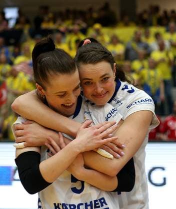 Stuttgart , Volleyball Bundesliga Womens PlayOff Final Game 5, SSC Palmberg Schwerin vs Allianz MTV Stuttgart , L R Corina Glaab Allianz MTV Stuttgart and Kayla Haneline Allianz MTV Stuttgart celebrate winning the German Volleyball Championship