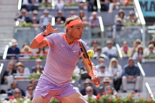 Mutua Madrid Open - Rafael Nadal vs Pedro Cachin MADRID, SPAIN - APRIL 29 : Rafael Nadal returns a shot against Pedro Cachin during their match on Day 8 of the Mutua Madrid Open at Caja Magica Stadium in Madrid. (Photo by Guillermo Martinez) Madrid Caja Magica Spain Copyright: xGuillermoxMartinezx