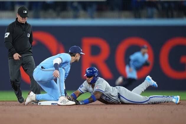April 29, 2024, Toronto, On, CANADA: Kansas City Royals outfielder Nelson VeloÂ¡zquez (17) slides safe into second base infant of Toronto Blue Jays second base Cavan Biggio (8) during first inning MLB, Baseball Herren, USA baseball action in Toronto on Monday, April 29, 2024. Canada News - April 29, 2024  - ZUMAc35_ 20240429_zaf_c35_119 Copyright: xNathanxDenettex