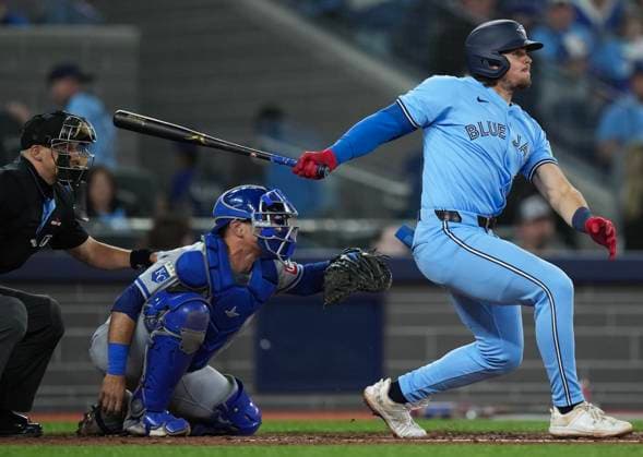 April 29, 2024, Toronto, On, CANADA: Toronto Blue Jays third baseman Addison Barger (47) hits a single as Kansas City Royals catcher Freddy Fermin (34) looks on during sixth inning American League MLB, Baseball Herren, USA baseball action in Toronto on Monday, April 29, 2024. Canada News - April 29, 2024  - ZUMAc35_ 20240429_zaf_c35_131 Copyright: xNathanxDenettex
