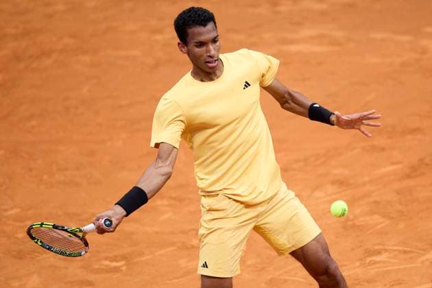 Mutua Madrid Open - Day Nine Felix Auger-Aliassime of Canada returns a shot against Casper Ruud of Norway during day nine of the Mutua Madrid Open 2024 at Caja Magica on April 30, 2024, in Madrid, Spain. Madrid Caja Magica Madrid Spain RL_MMO24_01330 Copyright: xRicardoxLarreinax