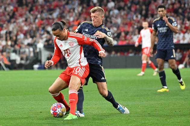 Muenchen, Allianz Arena, 30 04 24, GER, Men, UEFA Champions League, Round of 16, Season 2023 2024, FC Bayern Muenchen Real Madrid Picture from left in duel Leroy SANE Muenchen and Toni KROOS Real Madrid Only for editorial use UEFA regulations prohibit any use of photographs as image sequences and or quasi video Bayern Germany