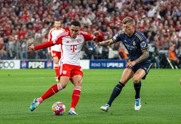 Football, Men, 2023 2024 season, Champions League semi-final, first leg , FC Bayern Munich Real Madrid, v l Jamal Musiala FC Bayern Munich , Toni Kroos Real Madrid , 30 04 2024, Copyright: xMatthiasxKochx