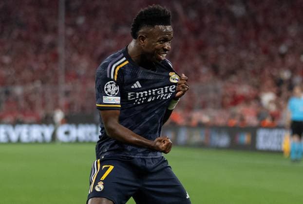 Vinicius Paixao de Oliveira Junior Real Madrid CF, 7 celebrates his goal for 0 1 GER, FC Bayern Muenchen vs Real Madrid CF, Football, Champions League, Semifinal, First leg, 2023 2024 season, 30 04 2024 DFL DFB REGULATIONS PROHIBIT ANY USE OF PHOTOGRAPHS as IMAGE SEQUENCES and or QUASI VIDEO GER, FC Bayern Muenchen vs Real Madrid CF, Football, Champions League, Semi-final, First leg, Match time 2023 2024, 30 04 2024 Muenchen Copyright: xEibner-Pressefoto HeikexFeinerx EP_HFR