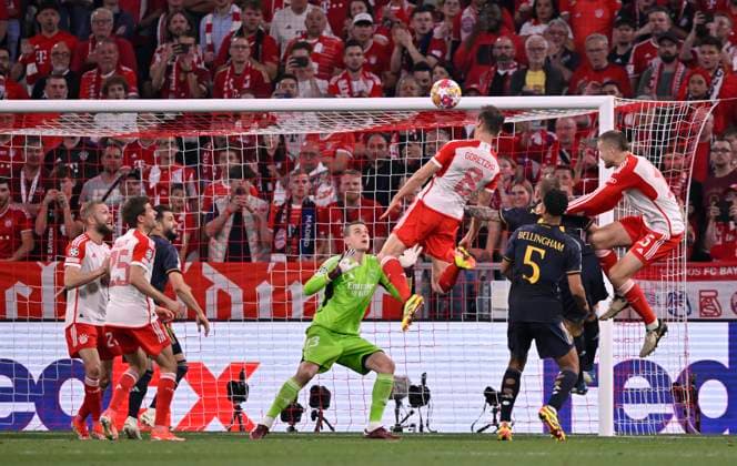 Penalty area scene, goal area scene header duel duel action Leon Goretzka FC Bayern Muenchen FCB 08 Eric Dier FC Bayern Muenchen FCB 15 Jude Bellingham Real Madrid 05 Goalkeeper Andriy Lunin Real Madrid 13 FC Bayern Muenchen FCB vs Real Madrid semi-final first leg 30 04 2024 DFL REGULATIONS PROHIBIT ANY USE OF PHOTOGRAPHS AS IMAGE SEQUENCES AND OR QUASI VIDEO FC Bayern Muenchen FCB vs FC Arsenal
