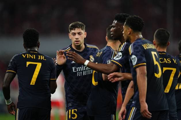 Vinicius Junior of Real Madrid celebrates with his teammates after scoring the 0-1 Bayern Munchen v Real Madrid. UEFA Champions League match.Semi-finals, first leg. Football, Allianz Arena Stadium, Madrid, Spain - 30 April 2024 Editorial use only  Copyright: xBaguxBlanco PRESSINPHOTO Shutterstockx 14456712g