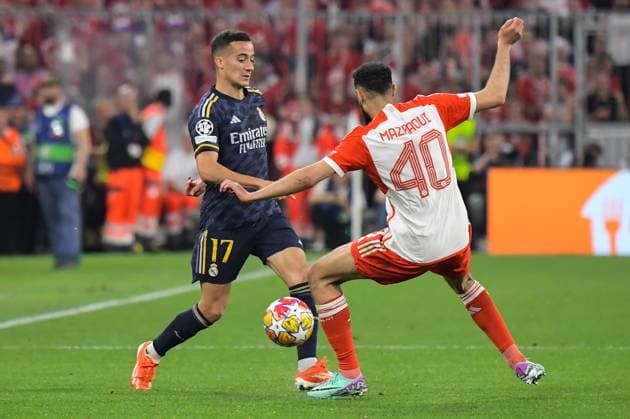 30 04 2024, xemx, Football UEFA Champions League, FC Bayern Muenchen Real Madrid emspor, v l Lucas Vazquez Real Madrid , Noussair Mazraoui FC Bayern Muenchen Zweikampf, Aktion, action, battle for the ball DFL DFB REGULATIONS PROHIBIT ANY USE OF PHOTOGRAPHS as IMAGE SEQUENCES and or QUASI VIDEO Muenchen