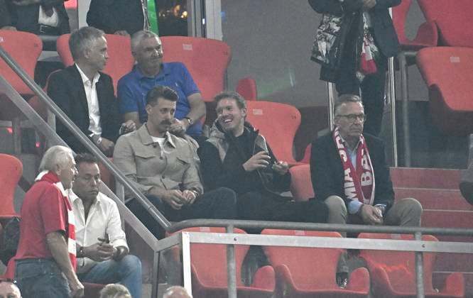 30 04 2024, Football UEFA Champions League 2023 2024 semi-final, FC Bayern Munich Real Madrid, in the Allianz Arena Munich L R Co coach Sandro Wagner Germany and national coach Julian Nagelsmann Germany in the stands DFL and DFB regulations prohibit any use of photographs as image sequences and or quasi video