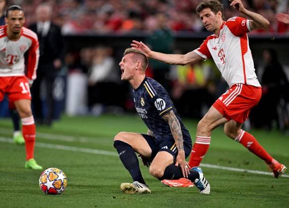 FOOTBALL CHAMPIONS LEAGUE SEASON 2023 2024 semi-final, first leg FC Bayern Muenchen Real Madrid 30 04 2024 Toni Kroos left, Real Madrid vs Thomas Mueller right, FC Bayern Muenchen