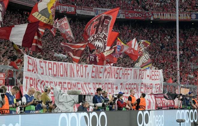 FOOTBALL CHAMPIONS LEAGUE SEASON 2023 2024 semi-final, first leg FC Bayern Muenchen Real Madrid 30 04 2024 FCB fans in the Allianz Arena with a banner, A STADIUM IN RED, A SQUAD IN RED AND WHITE