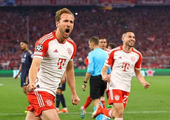 Harry Kane of Bayern Munich celebrates scoring his sides second goal Bayern Munich v Real Madrid, UEFA Champions League, Semi Final, First Leg, Football, Allianz Arena, Munich, Germany - 30 Apr 2024 EDITORIAL USE ONLY No use with unauthorised audio, video, data, fixture lists, club league logos or live services. Online in-match use limited to 120 images, no video emulation. No use in betting, games or single club league player publications.  Copyright: xMichaelxZemanek Shutterstockx 14454338av