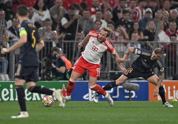30 04 2024, Football UEFA Championsleague 2023 2024 Semifinal, FC Bayern Munich Real Madrid, at Allianz Arena Munich L R Harry Kane Bayern Munich vs Toni Kroos Real Madrid DFL and DFB regulations prohibit any use of photographs as image sequences and or quasi video