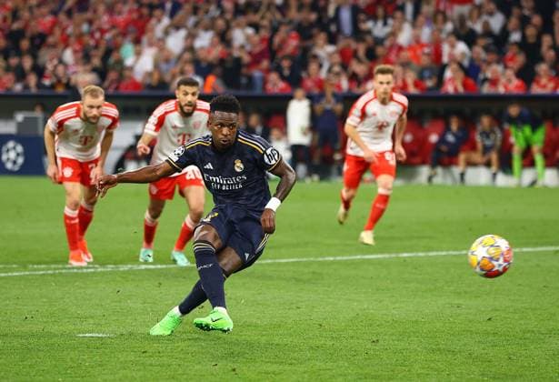 Vinicius Junior of Real Madrid scores his sides second goal from penalty Bayern Munich v Real Madrid, UEFA Champions League, Semi Final, First Leg, Football, Allianz Arena, Munich, Germany - 30 Apr 2024 EDITORIAL USE ONLY No use with unauthorised audio, video, data, fixture lists, club league logos or live services. Online in-match use limited to 120 images, no video emulation. No use in betting, games or single club league player publications.  Copyright: xMichaelxZemanek Shutterstockx 14454338bg