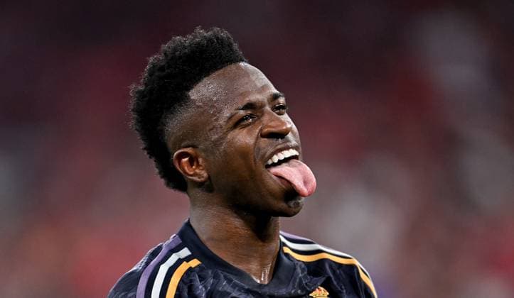 FOOTBALL CHAMPIONS LEAGUE SEASON 2023 2024 Semi-final, first leg FC Bayern Muenchen Real Madrid 30 04 2024 Real Madrid cheer Two-goal scorer Vinicius Junior sticks out his legs Real Madrid after the penalty goal to make it 2 2
