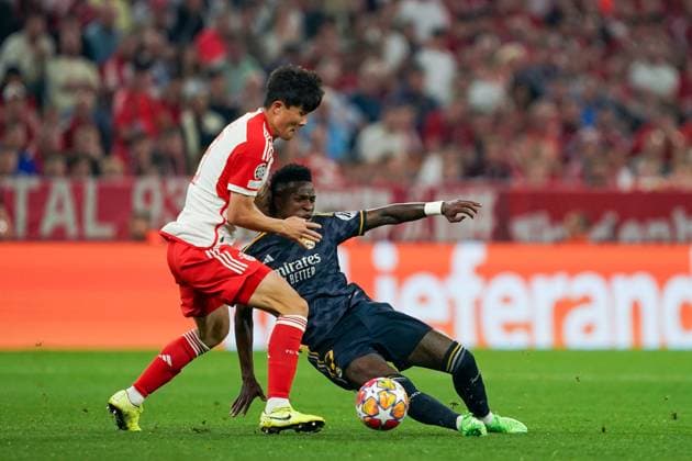 Munich, Germany, April 30th 2024: Minjae Kim (3 Bayern Munich) tackles Vinicius Junior (7 Real Madrid) during the UEFA Champions League semifinal football match between FC Bayern Munich and Real Madrid at Allianz Arena in Munich, Germany. (Daniela Porcelli SPP) Copyright: xDanielaxPorcellix xSPPx spp-en-DaPoSp-20240430-DP102596