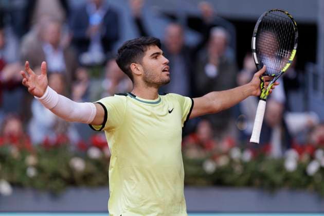 MADRID, SPAIN - APRIL 30: Carlos Alcaraz celebrates against Jan-Lennard Struff during their match on Day 9 of the Mutua Madrid Open at Caja Magica Stadium in Madrid. ONLYxEDITORIALxUSAGE  (251769068)
