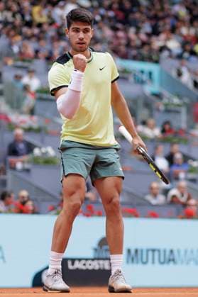 MADRID, SPAIN - APRIL 30: Carlos Alcaraz celebrates against Jan-Lennard Struff during their match on Day 9 of the Mutua Madrid Open at Caja Magica Stadium in Madrid. ONLYxEDITORIALxUSAGE  (251769121)