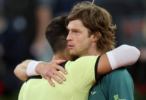 Andrey Rublev of Russia hugs Carlos Alcaraz of Spain Mutua Madrid Open, Day 10, Tennis, La Caja Magica, Madrid, Spain - 01 May 2024  Copyright: xEllaxLing Shutterstockx 14454210ax