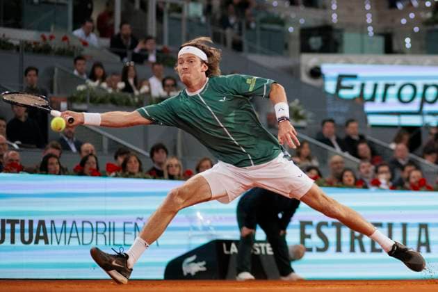 Mutua Madrid Open - Carlos Alcaraz vs Andrey Rublev MADRID, SPAIN -MAY1: Andrey Rublev returns a shot against Carlos Alcaraz during their match on Day 10 of the Mutua Madrid Open at Caja Magica Stadium in Madrid. (Photo by Guillermo Martinez) Madrid Caja Magica Spain Copyright: xGuillermoxMartinezx