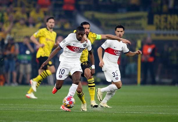 01 05 2024, Football UEFA Champions League 2023 2024, Semi-final, Borussia Dortmund FC Paris Saint Germain at Signal Iduna Park Dortmund Ousmane Dembele Paris Saint Germain vs Emre Can Borussia Dortmund DFL and DFB regulations prohibit any use of photographs as image sequences and or quasi video