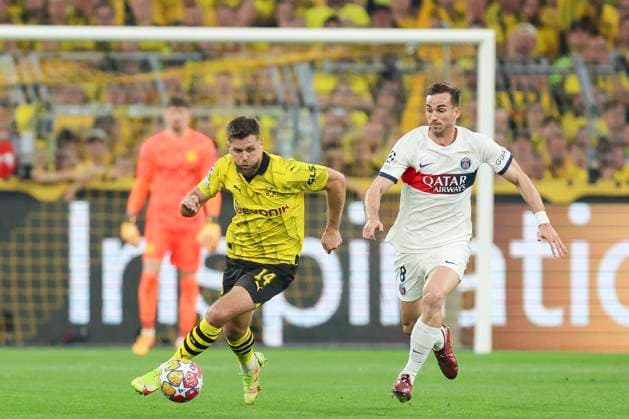 Niclas Fuellkrug Borussia Dortmund and Fabian Ruiz Paris Saint Germain fight for the ball, UEFA Champions League 2023 24 Semi finals First Leg, Borussia Dortmund vs Paris Saint Germain, Signal Iduna Park, 01 05 2024, Dortmund, Germany