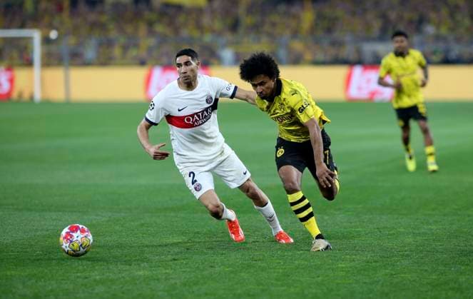01 05 2024, Football UEFA Champions League 2023 2024, Semi-final, Borussia Dortmund FC Paris Saint Germain at Signal Iduna Park Dortmund v li Achraf Hakimi Paris Saint Germain v Karim Adeyemi Borussia Dortmund DFL and DFB regulations prohibit any use of photographs as image sequences and or quasi video