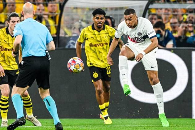 DORTMUND - (l-r) Ian Maatsen of Borussia Dortmund, Kylian Mbappe of Paris Saint Germain during the UEFA Champions League semi-final match between Borussia Dortmund and Paris Saint Germain at Signal Iduna Park on May 1, 2024 in Dortmund, Germany. ANP Hollandse Hoogte UEFA Conference League 2023 24 2023 2024 xVIxANPxSportx xGerritxvanxKeulenxIVx 497376183 originalFilename: 497376183.jpg