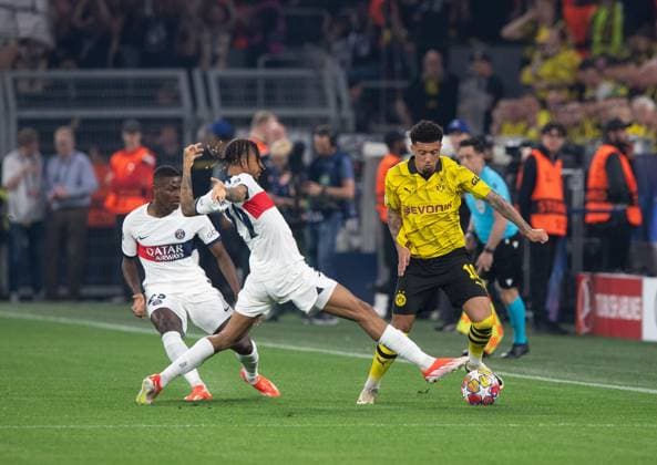 Football, Men, 2023 2024 season, Champions League semi-final, first leg , Borussia Dortmund Paris Saint Germain, v l Nuno Mendes PSG, Paris Saint Germain , Bradley Barcola PSG, Paris Saint Germain , Jadon Sancho Borussia Dortmund , 01 05 2024, Copyright: xSebastianxRäppold MatthiasxKochx