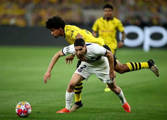 01 05 2024, Football UEFA Champions League 2023 2024, Semi-final, Borussia Dortmund FC Paris Saint Germain at Signal Iduna Park Dortmund Karim Adeyemi Borussia Dortmund vs Achraf Hakimi Paris Saint Germain DFL and DFB regulations prohibit any use of photographs as image sequences and or quasi video