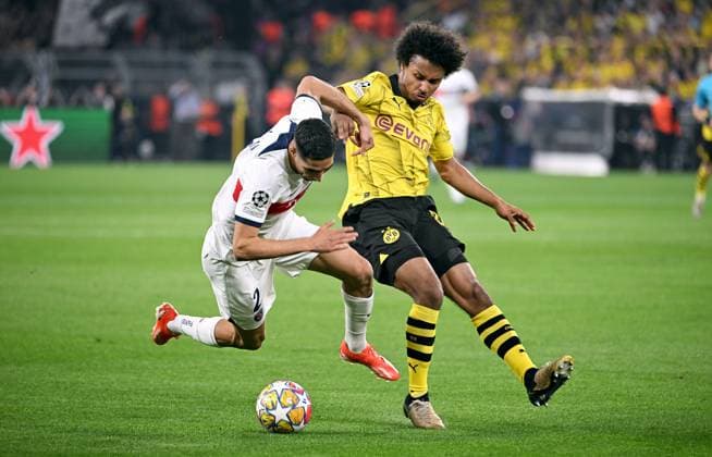 Football, Champions League, Germany, Men, Season 2023 2024, Semi-Final First Leg, Signal Iduna Park Dortmund Bor Dortmund Paris St Germain Achraf Hakimi PSG , Karim Adeyemi BVB Action UEFA REGULATES PROHIBIT ANY USE OF PHOTOGRAPHS AS IMAGE SEQUENCES AND OR QUASI VIDEO