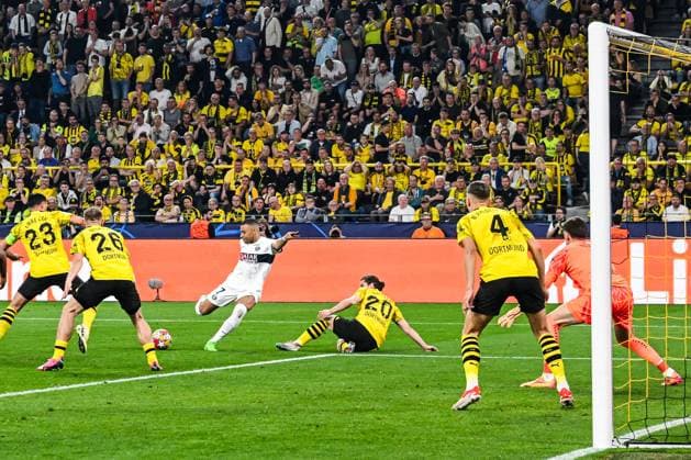 DORTMUND - Goal attempt by Kylian Mbappe of Paris Saint Germain during the UEFA Champions League semi-final match between Borussia Dortmund and Paris Saint Germain at Signal Iduna Park on May 1, 2024 in Dortmund, Germany. ANP Hollandse Hoogte UEFA Conference League 2023 24 2023 2024 xVIxANPxSportx xGerritxvanxKeulenxIVx 497379912 originalFilename: 497379912.jpg