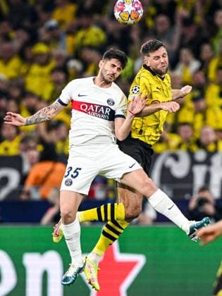 DORTMUND - (l-r) Lucas Beraldo of Paris Saint Germain, Niclas Fullkrug of Borussia Dortmund during the UEFA Champions League semi-final match between Borussia Dortmund and Paris Saint Germain at Signal Iduna Park on May 1, 2024 in Dortmund, Germany. ANP Hollandse Hoogte UEFA Conference League 2023 24 2023 2024 xVIxANPxSportx xGerritxvanxKeulenxIVx 497380760 originalFilename: 497380760.jpg
