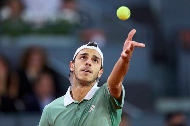 Mutua Madrid Open - Day Ten Francisco Cerundolo of Argentina serves against Taylor Fritz of United States during day ten of the Mutua Madrid Open 2024 at Caja Magica on May 1, 2024, in Madrid, Spain. Madrid Caja Magica Madrid Spain RL_MMO24_01807 Copyright: xRicardoxLarreinax